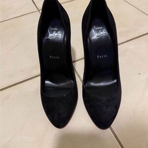 Christian Louboutin Elegant Black Heels. Never worn. Run a little small.
